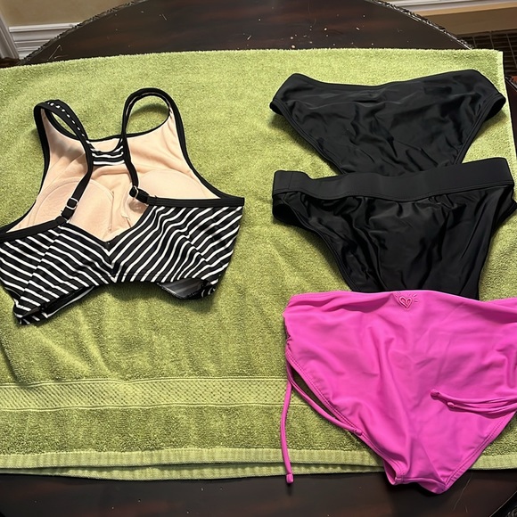 1 swim suit top with 3 bottoms. Different brands but all small. - Picture 2 of 3